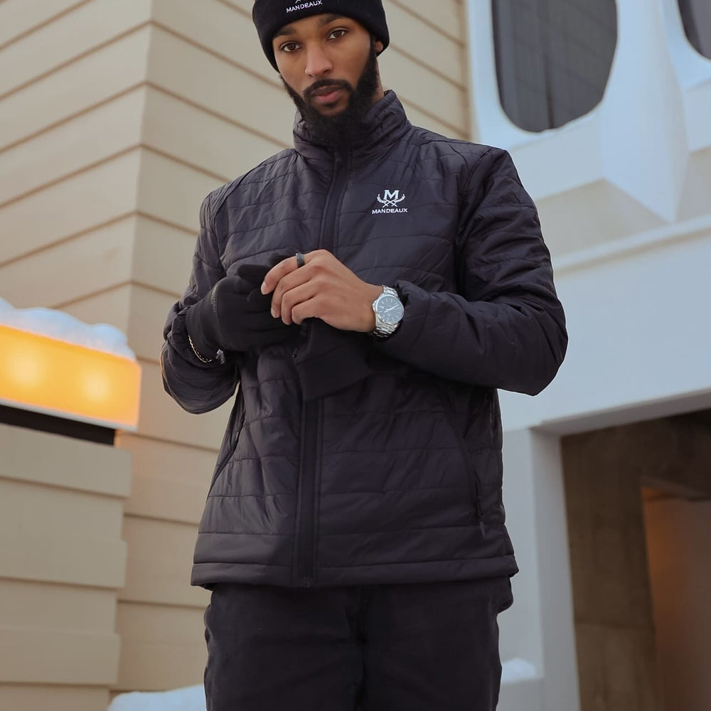 Mandeaux Bubble Jacket in black worn outdoors, lightweight packable puffer
