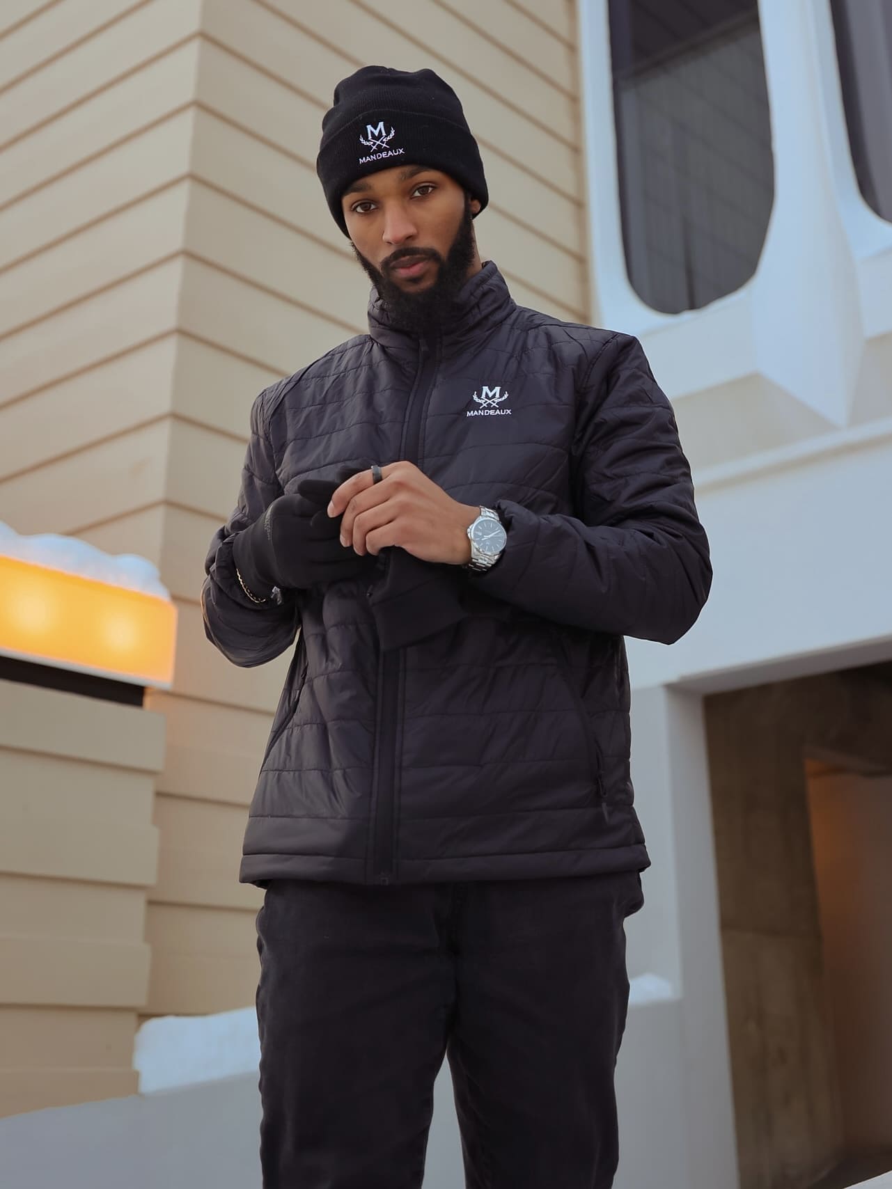 Mandeaux Bubble Jacket in black worn outdoors, lightweight packable puffer